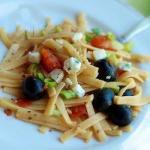 American Pasta with Tomatoes Olives and Goat Cheese Appetizer