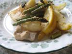 American Roast Chicken With Potatoes Lemon and Asparagus Dinner