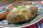American Baked Potatoes in Their Jackets With Sour Cream Topping Appetizer